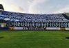 Aficionados azules arropan de banderas la cabecera norte del estadio Nacional previo al juego ante Real España